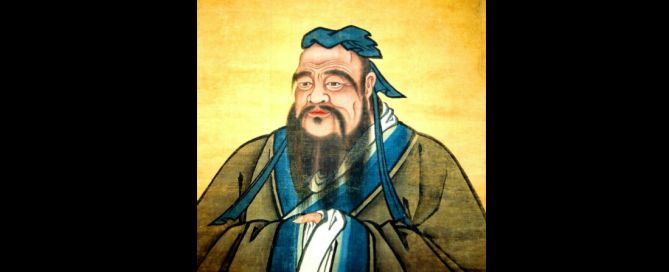 Traditional Chinese portrait painting of Confucius in blue and gold robes.